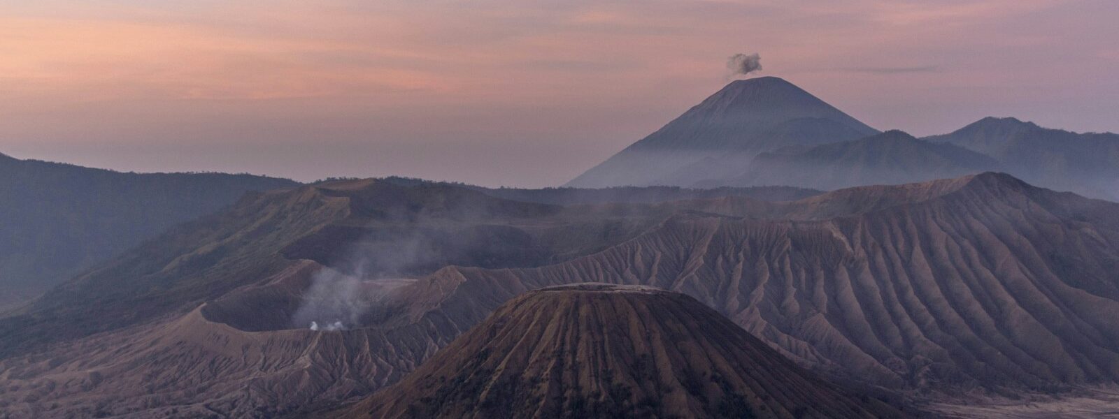 landscape of mountains and volcano