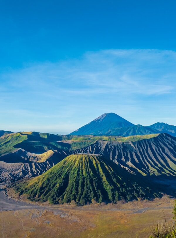 green and brown mountain under blue sky during daytime