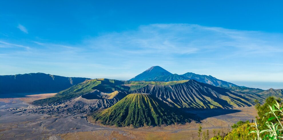 green and brown mountain under blue sky during daytime