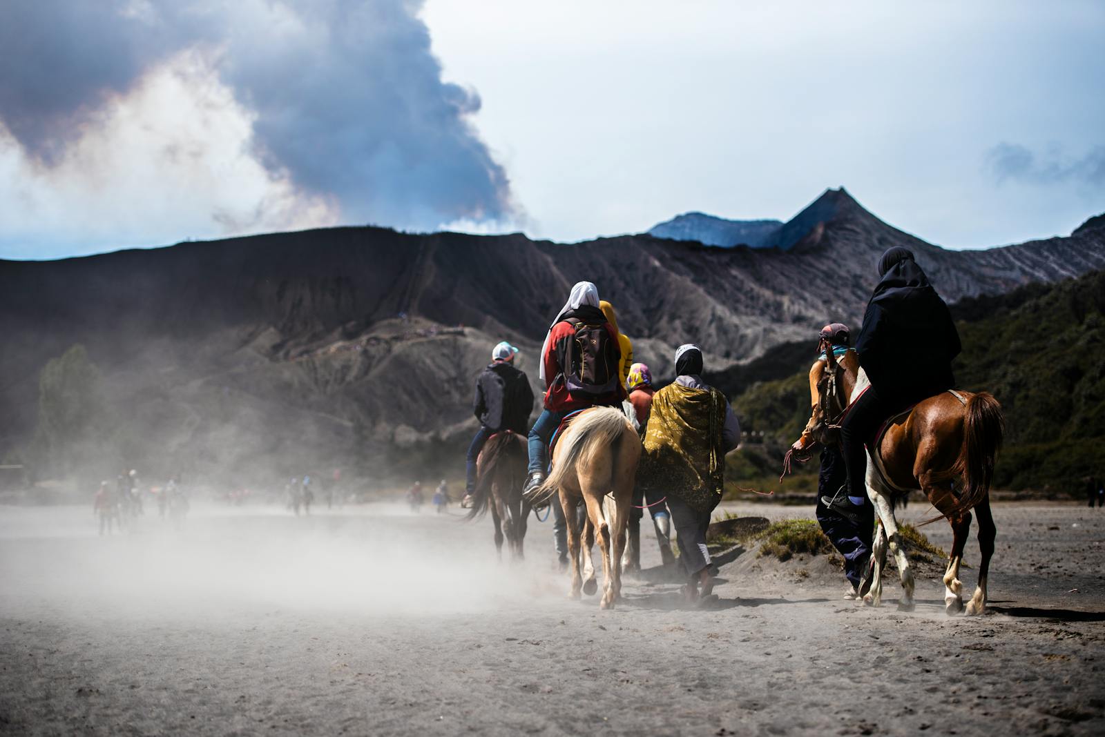 Photo of People Riding on Horses